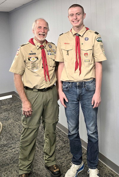 SCOUT MASTER KEITH EILTS OF HAYS (left) shares a proud moment with Riley after the Eagle Scout accomplishment.