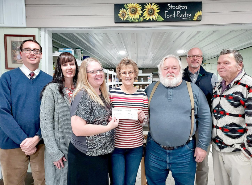 PICTURED at the Stockton Food Pantry check presentation were (from left): SNB Cashier-Executive VP Jonathan Berkley, SNB Sr. Operations Officer Ginger Kriley, SNB Sr. VP of Loan Administrator Amber Muir, Food Pantry Secretary/Treasurer Patty Jackson, Food Pantry Vice President Mike Rogers, SNB President Dale Winklepleck, and Food Pantry President Duane Harris.