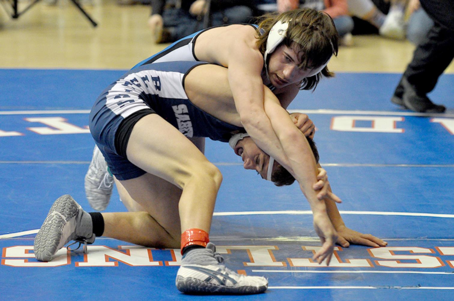 EMERSON LOWRY, wrestling at 126, fought his way to an exciting win over Cullen Wikle of Sabetha in his opening match of the state wrestling tournament.