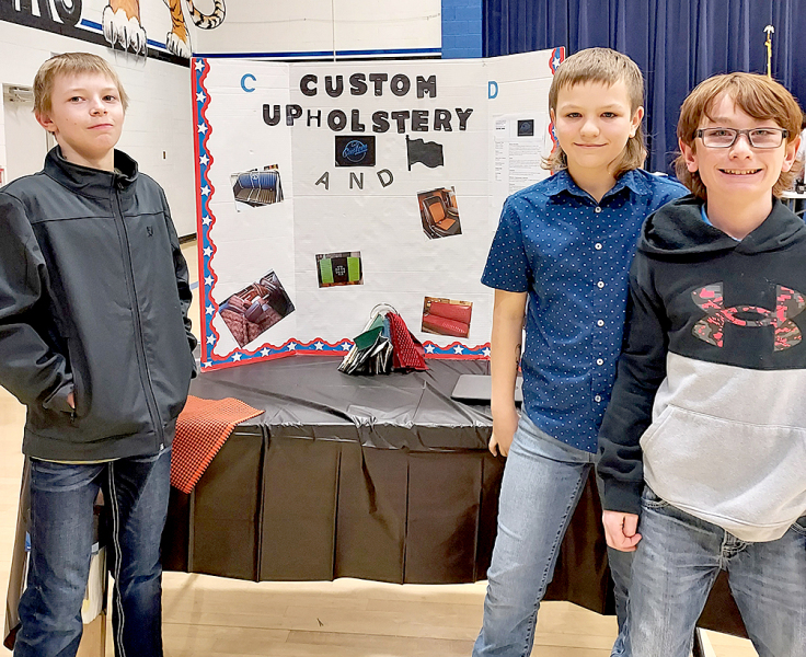 MAKING UP THE TEAM of “C&amp;D Custom Upholstery” were Cameron Earl, Dayton Carpenter and Beckem Hilbrink (Stockton) at the Rooks County YEC.