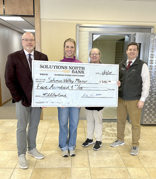 IN ATTENDANCE at the presentation on Wednesday, January 17th, were Solutions North Bank President Dale Winklepleck, Solomon Valley Manor Administrator Amanda Atkisson, Senior Vice President of the Loan Administration Department Amber Muir, and Solutions North Bank Senior Vice President Brian Berkley. (Courtesy Photo)