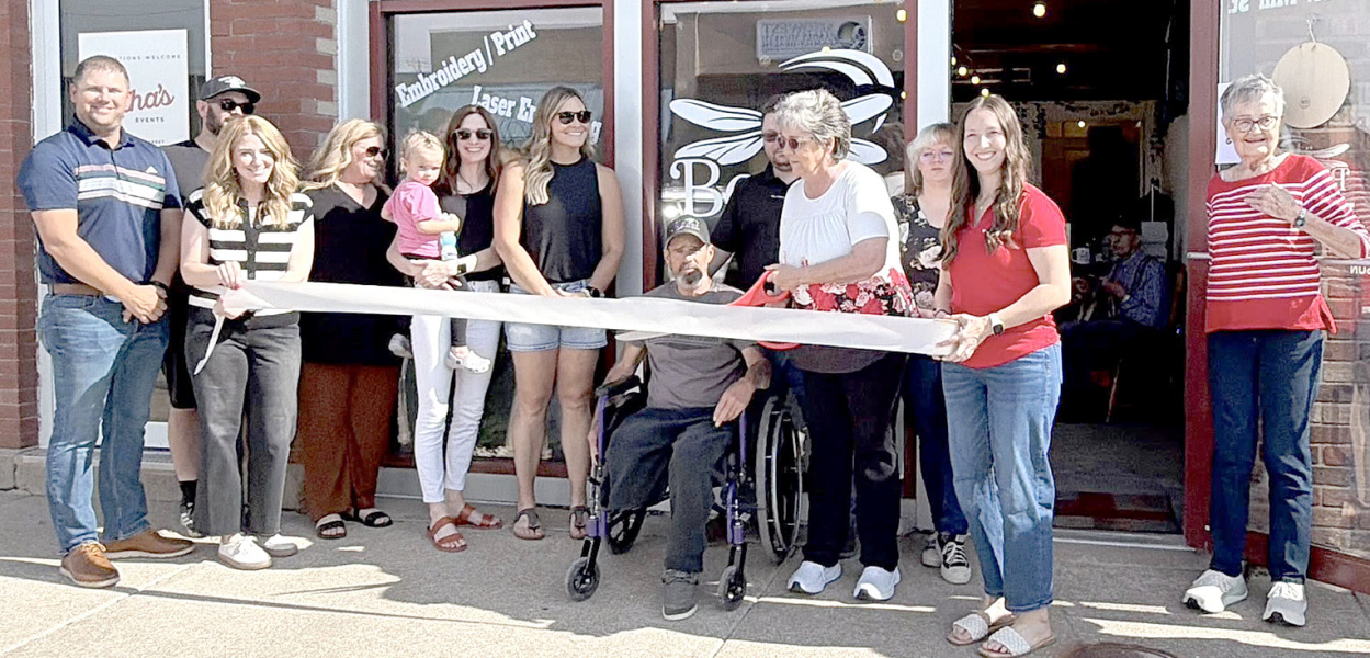 THE BOONEART STUDIO, located at 211 1/2 West Mill Street in Plainville, held its ribbon cutting on Friday, May 29th. Present were Justin Casey, Adam Comeau, Samantha Pfannenstiel, Kelli Hansen, Hollis Comeau, Ashley Comeau, Nichole Ganoung, Randy King, Jessie Goodenow, Missy Boone-King, Kayla Goodenow, Jaci Wise, and Barbara Morin. (Photo Courtesy of Peggi Axelson)