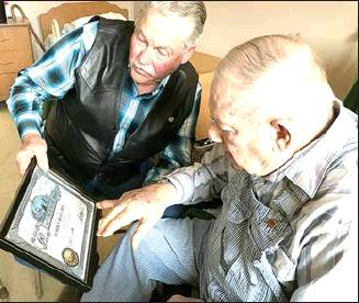 ROBERT DIX (right) is shown receiving his 60-year pin for his years of membership in the Masonic Lodge this past May. Making the presentation is Paradise Lodge #290 Chaplain Darrell Rubottom, Woodston. Robert joined the Newahcuba Lodge #189 back in May of 1959 here in Stockton.The lodge was disbanded many years ago, and members were transferred to the Paradise Lodge in Plainville.