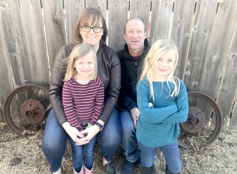 CHELSEY PETERSON, owner of The Daily Grind, is pictured with her family, Finley, age 4, and Emery, age 6; and next to Chelsey is her husband, Andy Peterson.