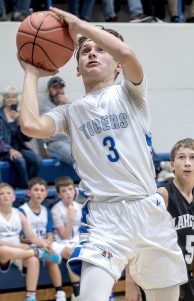 Lane Muir shoots a floater in the paint vs. Lakeside