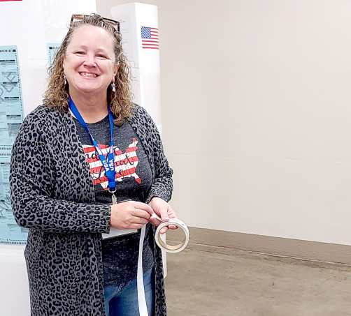 GIVING EVERYONE an “I Voted” sticker during Election Day at Stockton City Hall was Martha Blair.