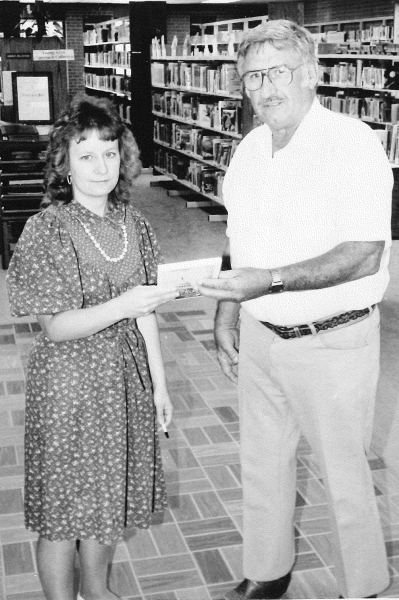 The book “Dynamic Freedoms” furnished by the bodies of the Scottish Rite of Free Masonry of Kansas and presented to the Most Worshipful Grand Lodge of Ancient, Free and Accepted Masons of Kansas in celebration of the Bi-Centennial of the Constitution of the United States Of America, was presented by Cleo Baughman on behalf of the Body to the Stockton Library in the Fall of 1989. Accepting the book for the facility was Mrs. Ken Bachman.