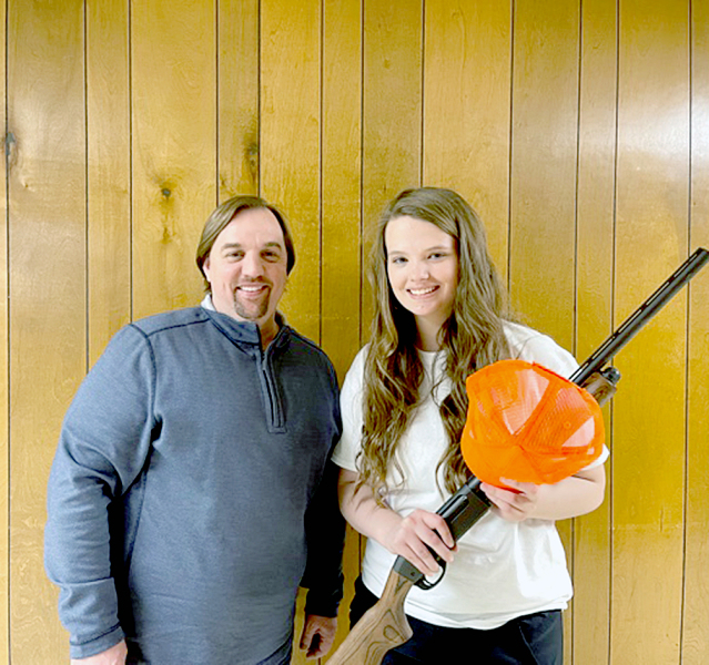 THIS YEAR'S shotgun/hunting license winner given away at the Solomon Valley Pheasant Forever Banquet was Tierra Yohon, picture with donor Travis Brunner.