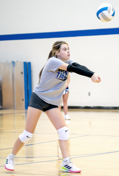 Lady Tiger Camille Lowry, a junior, passes the ball during the scrimmage held Friday, August 22.