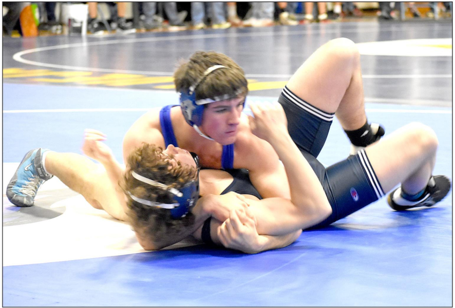 RYLAN BASART (top) won by a fall over Chandler Seaton (Leoti-Wichita County) at the Regional Wrestling Tournament in Norton February 21-22. (Photo Courtesy of Bobbi Basart)