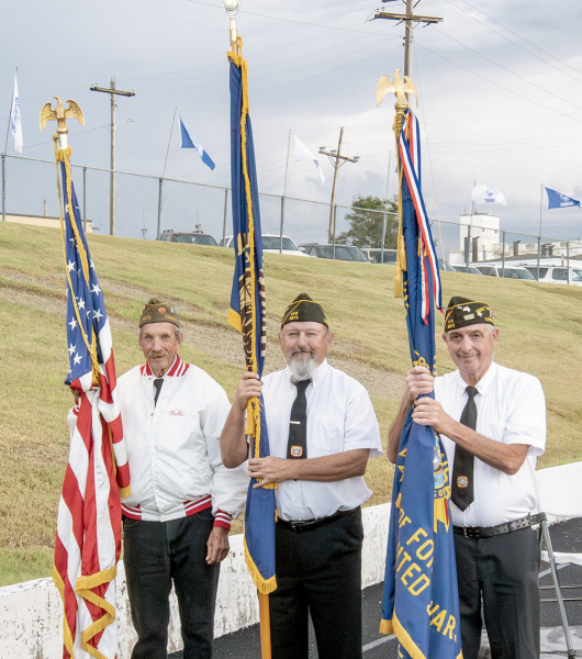 MEMBERS OF THE VFW POST 8873 Color Guard, Mark Trumbo, Mack Palmer, and Ed Thayer presented the colors prior to Friday night’s Homecoming game against Sylvan-Lucas.