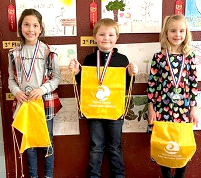 SECOND-GRADE POSTER WINNERS from Rooks County for 2021 include, from left: 2nd Place, Hannah Gosselin, Damar Elementary; 3rd Place, Elvin Jones, Plainville Grade School; and 4th, Makinley Riener, Stockton Grade School. Not pictured but placing first was Adrenna Lowry, Plainville Grade School.