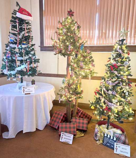 FORTY-TWO TREES mark the 40th annual Parade of Christmas Trees at the Stockton Public Library this year. The SGS Second Grade, the Blessed Beginnings Center, and the Nova Theatre decorated these trees.