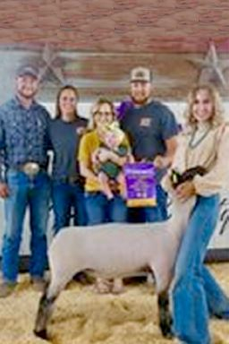 GRAND CHAMPION MARKET LAMB was exhibited by Cady Pieper of the Palco 4-H Club. The Reserve Champion Market Lamb was exhibited by Olivia Dix of the Star 4-H Club. (Courtesy Photo)