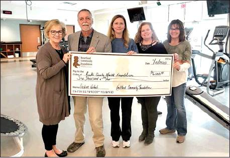 THE HEARTLAND COMMUNITY FOUNDATION recently awarded RCH $6,000 for an ECG monitor. Pictured at the presentation of the grant are, from left: Sandy Jacobs, Executive Director of Heartland Community Foundation; Eric Sumearll, Executive Director, Rooks County Healthcare Foundation; Angela Hahn, Director of Cardiac Rehab at RCH; Kelli Hansen, HCF board member; and Kathy Ramsay, HCF board member.