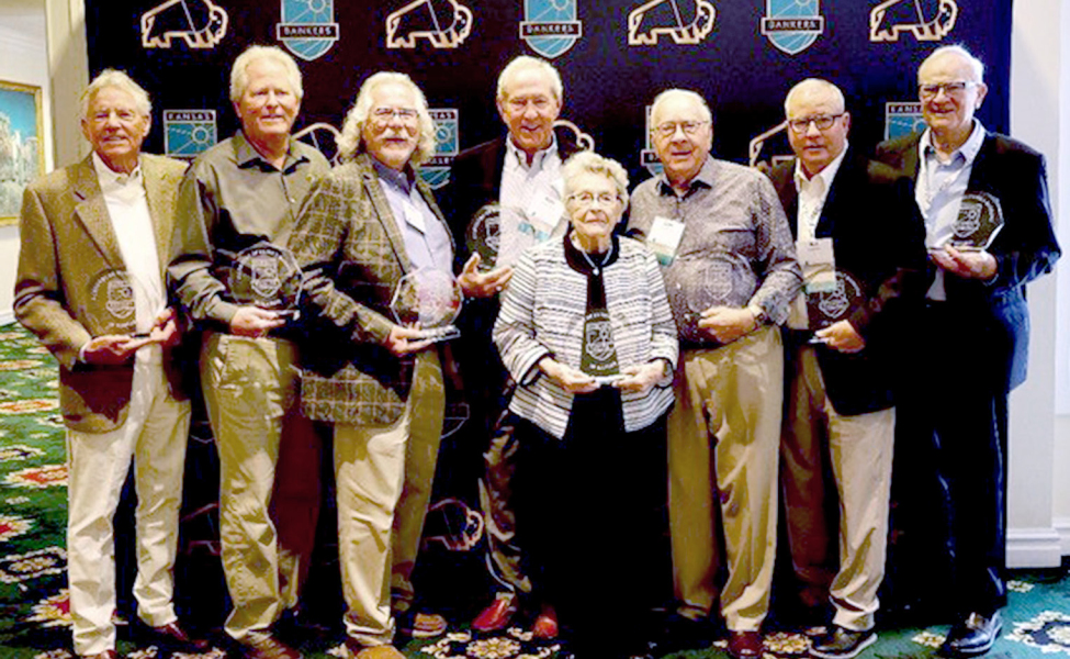 PICTURED is the Berkley family after receiving the Century of Family Banking Award this summer. Pictured are (from left to right) James Berkley, Solutions North Bank Chairman; Jeff Berkley, Alliance Bank Chairman; Burke Matthews, President Emeritus, Bennington State Bank; Mike Berkley, Bennington State Bank Chairman; Lila Berkley; Don Berkley; Bill Berkley, State Bank of Downs; and Mark Berkley, Chairman Emeritus, The Bank of Tescott.
