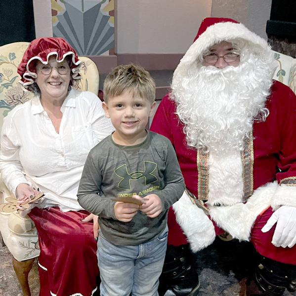 DECLAN HAHN was excited to tell Santa and Mrs. Claus the items on his Christmas Wish List during the Stockton Chamber of Commerce’s Olde Tyme Chirstmas festivites held last Friday night.