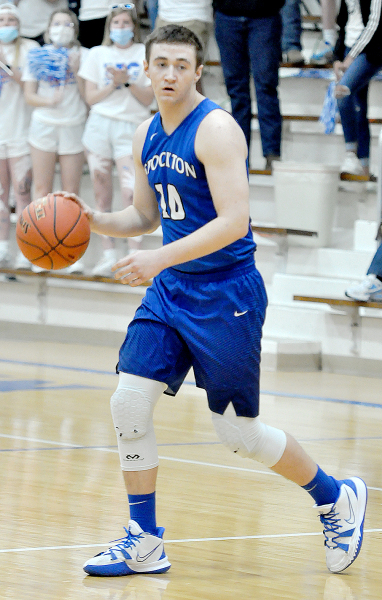 STOCKTON SENIOR ETHAN MEANS surveys the court during the Tigers’ game against Ness City in the quarterfinals of the Class 1A, Div. 1 State Basketball Tournament.