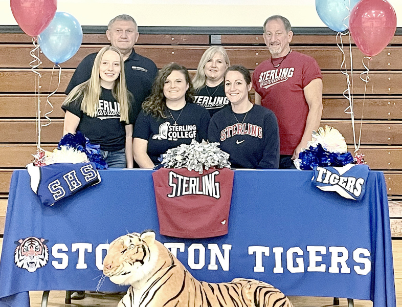 ON MONDAY, NOVEMBER 21, Addie Struckhoff, a Stockton High School senior, signed a letter of intent to cheer at Sterling College next year. Struckhoff will join her high school colleague Delany Snyder who is in her first year of cheering for the Warriors. On hand for the signing were front row, from left: Delany Snyder, Addie Struckhoff, and Sterling Cheer Coach Jessica Saiz; and back row, Addie’s parents: John Struckhoff, and Bobbi and Justin Basart.