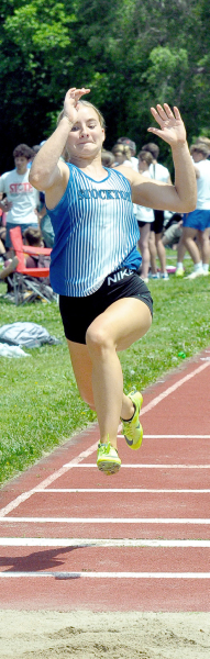 AVA DIX hits her mark as she competes in Long Jump at Regionals in Washington.