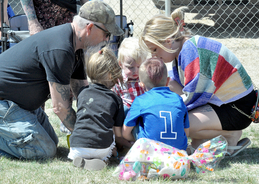 KEVIN STATES, LANDRIN LEAKE, Ravin Leake, Rekker States, and Rhyatt States gather following the annual Sigma Phi ESA Easter Egg Hunt to discover their findings.