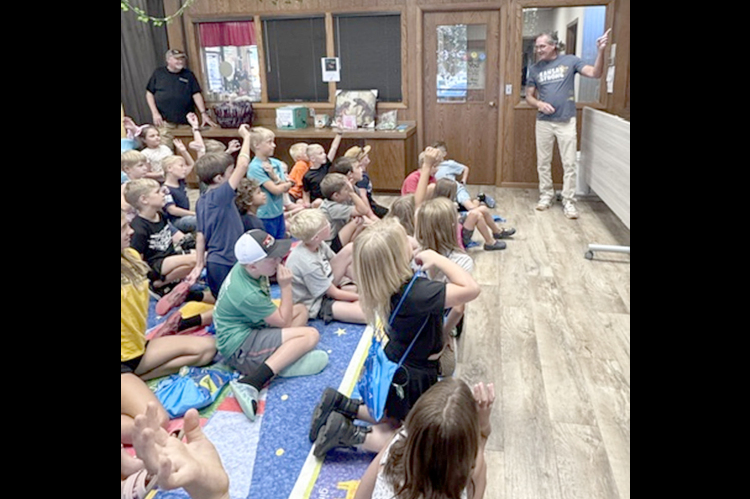 WARREN MARTIN with Kansas Strong and Randy Prater with Polymer Services giving a Program on Monday during UnEarth A Story of Kansas oilfields.