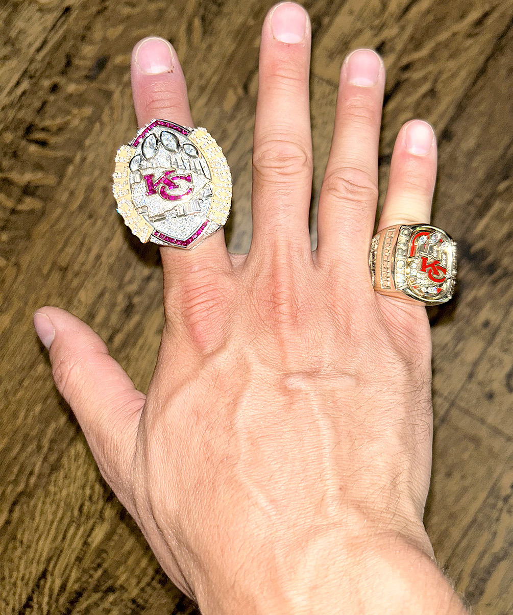 ANDREW RECEIVED TWO SUPER BOWL RINGS from the Kansas City Chiefs organization after their back-to-back Super Bowl wins. The smaller one on his pinky is when he was working in a part-time seasonal position for the team. Bellerive received the larger ring from the 2024 Super Bowl win against the San Francisco 49ers since he is now a full-time employee of the Chiefs organization.