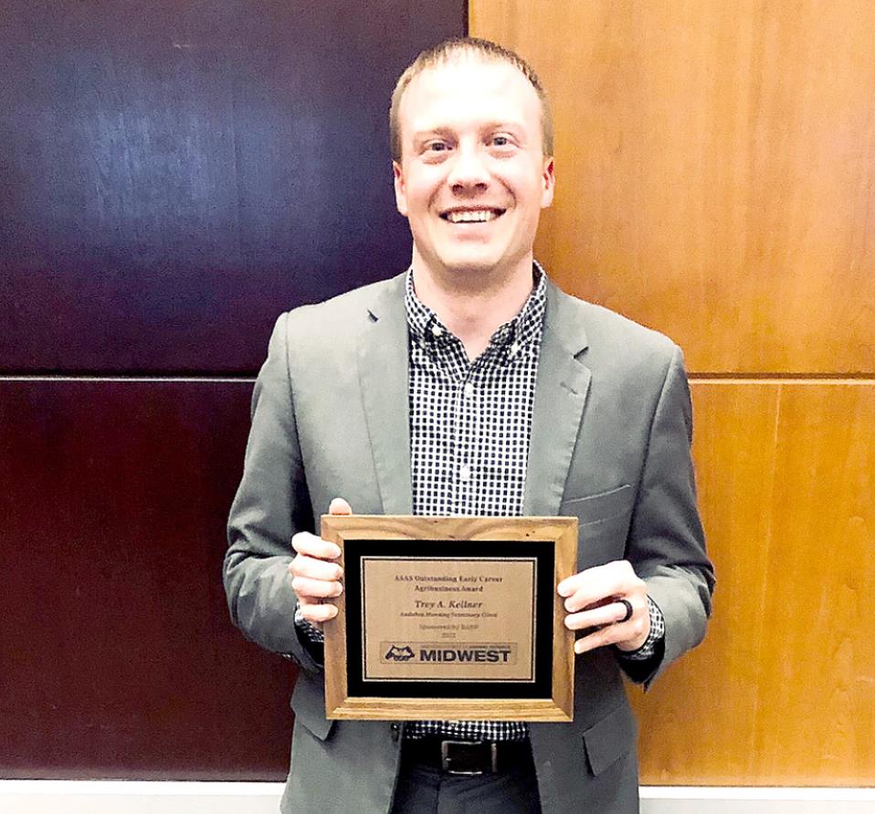 DR. TREY A. KELLNER rceived the Outstanding Early Career Agribusness Award during the ASAS Midwest Section Meeting held March 14-16 in Omaha, Neb. Kellner was a 2006 graduate of Stockton High School.