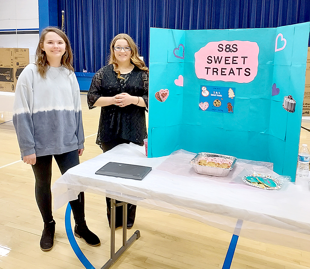 SHAE YOHON and Skylar Amlong (Stockton) presented their “S&S Sweet Treats” at the Rooks County YEC.