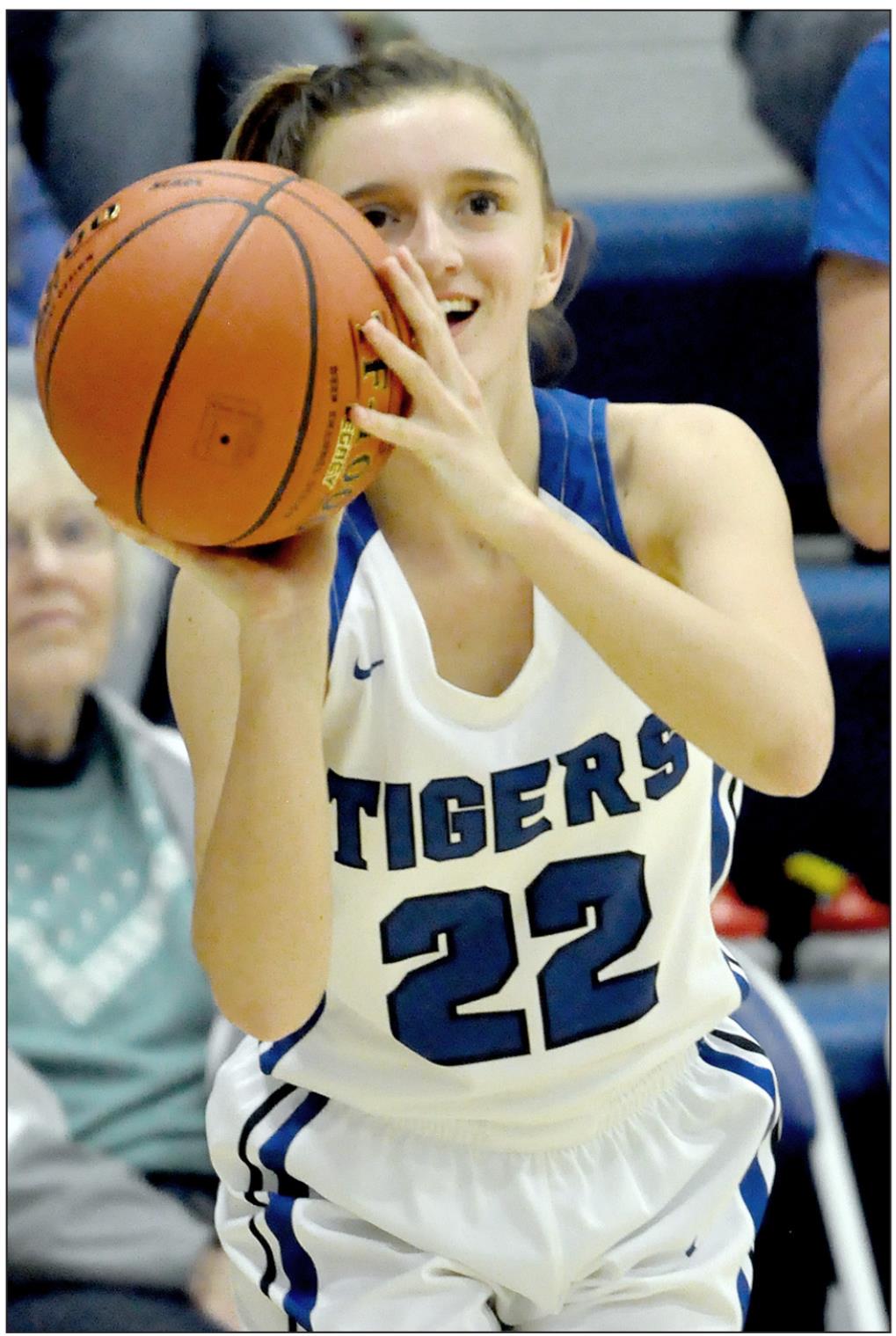 SHS SENIOR LADY TIGER TATUM HAMILTON is all smiles as she lines up one of her two 3’s against LaCrosse last Tuesday, February 18th, in Stockton.