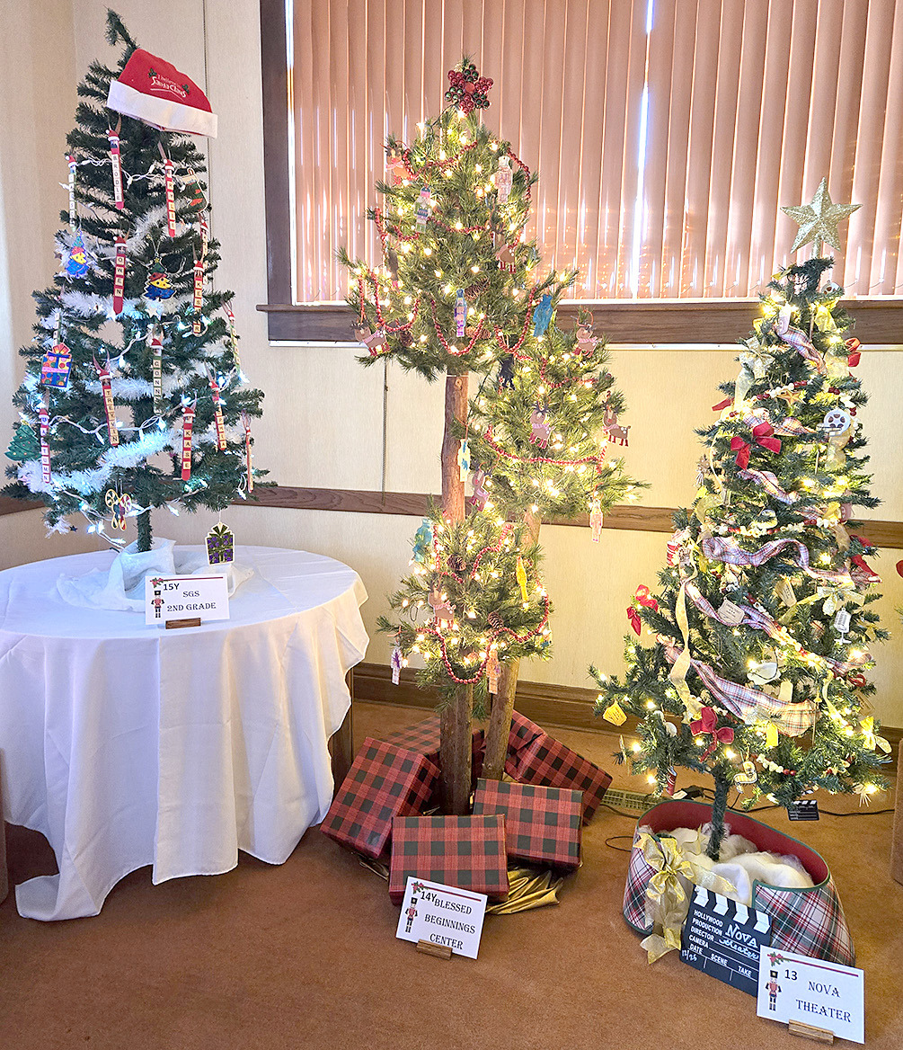 FORTY-TWO TREES mark the 40th annual Parade of Christmas Trees at the Stockton Public Library this year. The SGS Second Grade, the Blessed Beginnings Center, and the Nova Theatre decorated these trees.