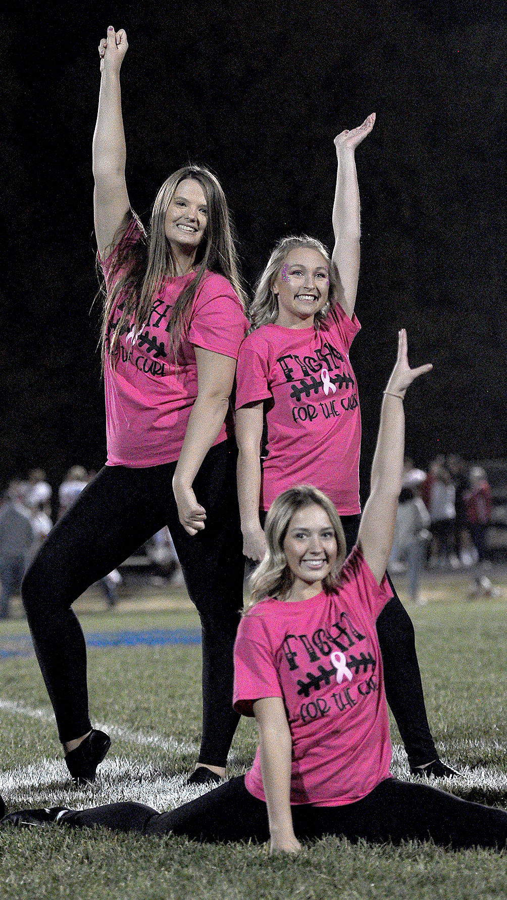 SHS SENIORS and Striders Tiara Yohon and Delanee Bedore (both standing) performed their last football dance routine on Friday, October 21st. Also pictured is Strider Claire Plumer, a junior.