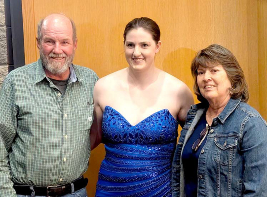 PAT HAGEMAN (left) with his daughter, Elena (Hageman) Jones, and his wife, Karen, at Elena’s master’s recital.