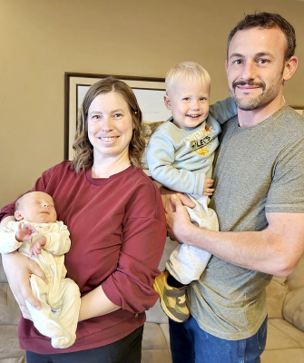 THE BAUGHMAN CREW is officially a party of four! The Sentinel's New Year's Baby, William Lloyd, made his long-awaited debut on March 25th, winning hearts — and the title — for proud parents Lyndsey and JD Baughman of Stockton. Pictured (from left): the guest of honor William, mom Lyndsey, big brother and self-appointed giftgiver Frederick, and dad JD.