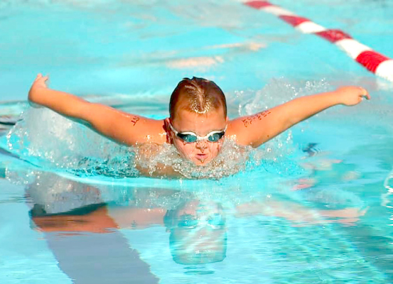 Trent Look in the 25 Butterfly at the Alma Qualifying Meet.