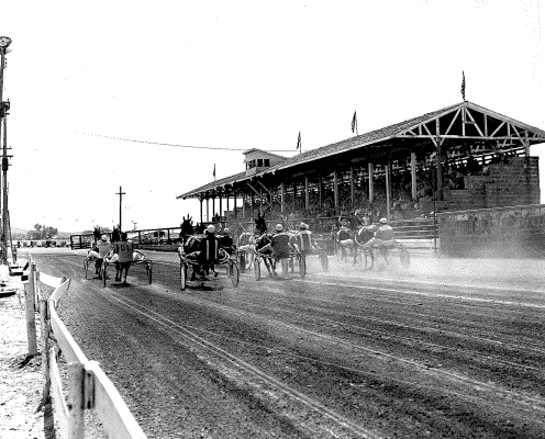 HERE COME THE TROTTERS! Harness horse racing was a significant part of the Rooks County Free Fair for many years, dating back to the 1920s. In fact, the Fair was the first place in Kansas to feature parimutuel harness racing in 1989, complete with a page in the fair book dedicated to “How To Bet.”