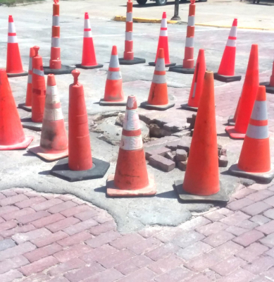THE MANHOLE 