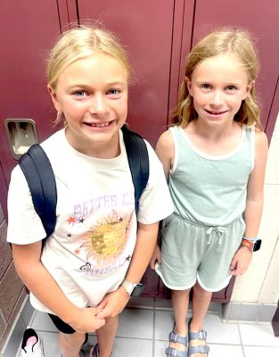 EMERY AND FINLEY PETERSON checked out their lockers and dropped off their school supplies during the SGS Open House on Tuesday, August 20th.