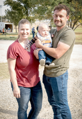 FREDERICK BAUGHMAN, along with his parents, Lyndsey and JD Baughman, was excited to take in all the sights and sounds at his first Pumpkin Patch last Saturday afternoon.