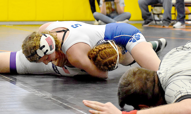 ASHLYN HAHN, wrestling at 120, pinned her way to a first-place finish at the Christmas City Wrestling Classic in WaKeeney on December 3. (Photo courtesy of Bobbi Basart)