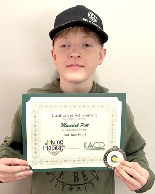 MAVERICK POST earned 1st place in the Rooks County Photo Contest and 2nd place at the Kansas Association of Conservation Districts (KACD) state-level contest. He was awarded $50 by the Rooks County Conservation District and $50 by KACD, along with a medal and certificate recognizing his achievements. The second-place was judged in Wichita at the annual convention.