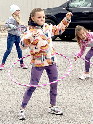 SHOWING OFF THEIR MAD HULA HOOP SKILLS