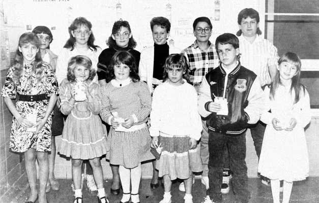 HONORABLE MENTION WINNERS at the Rooks County Soil Conservation Poster Contest in 1989 were (front row, from left) Kerrie Rempe, Stephanie Gosselin, Tara Towns, Valarie Dowis, Damien Mick, Kristi Darnell; (back row) Christy Desaire, Sandra Eichman, Rhonda Desaire, Jamie Normandin, Chad Gosselin, and Scott Kortan.