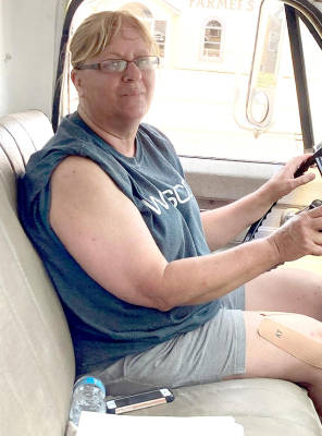 BECKY WILLIAMS, Marvin Jackson’s daughter, brought in the first load of wheat to the Stockton Farmers Union Elevator on Wednesday, June 23rd. (Courtesy Photo)