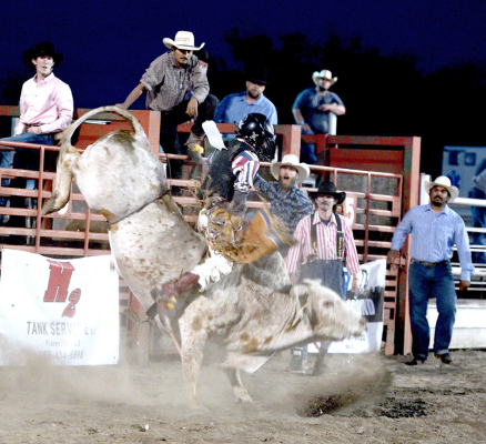 THIS IS THE FIRST annual Wild Horse Creek Bull and Barrels event at the Plainville Saddle Club arena. Thaddeus Towns, Palco, earned 75 points on this ride. There were around 30 bull riders and several Junior Barrel Racers as well. (Photo Courtesy of Candace Rachel)