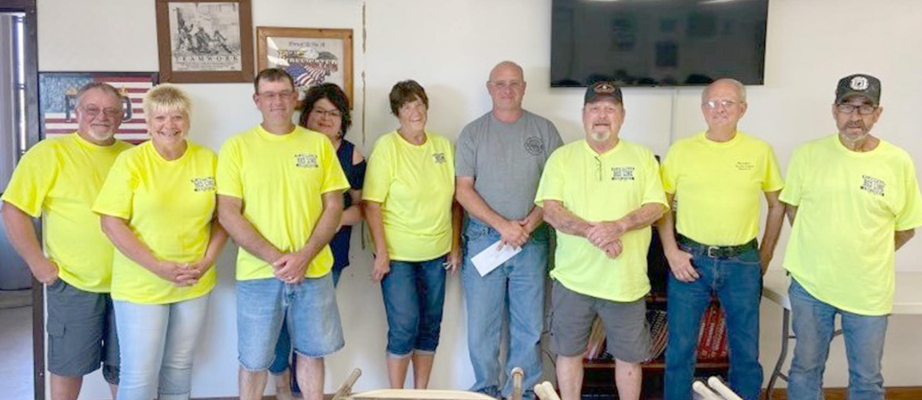 Plainville Red Line Cruisers gift $2,000 check to fire department
