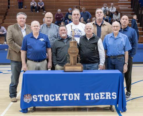 Members of the 1981 Class 2A State Basketball Champions were in Stockton last Friday, when they were recognized for their accomplishment on the court 45 years ago. From left are: Gary Knight, David Reed, Tim Talbert, Doug Dix, Matt Miller, head coach Jim Brickell, Mike Miller, assistant coach Robert Reed, and Rick Bice. The group, along with family and friends, gathered at 1872 Italian Eatery that evening, where they enjoyed eating and reminiscing for several hours.