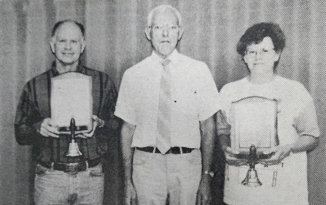 STOCKTON GRADE SCHOOL PRINCIPAL FRANCIS MAHONEY, (middle) presented teachers Don LaRue and Donna Griebel with their bell and plaques recognizing them for their 25 years of teaching at Stockton Grade School at the end of the 1994 school year.