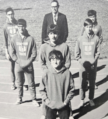 THE 1972 STOCKTON HIGH SCHOOL CROSS COUNTRY TEAM consisted of (front) Dwight Seaman; (second row, from left) Larry Poore, Tim Votapka, Wendell Peacock; (back row) Stan Unruh, coach Jack Miller, and Marlon Locke.