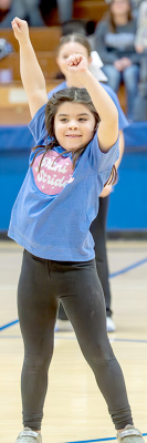 MINI STRIDER Hallie Gallaway dances away during halftime of the basketball game between Stockton and Natoma.